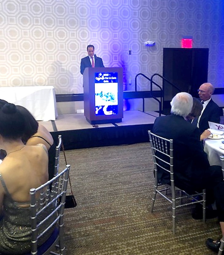 Dr. Zureikat introducing Aatur D. Singhi, MD, PhD, who received the foundation’s Excellence in Science Award